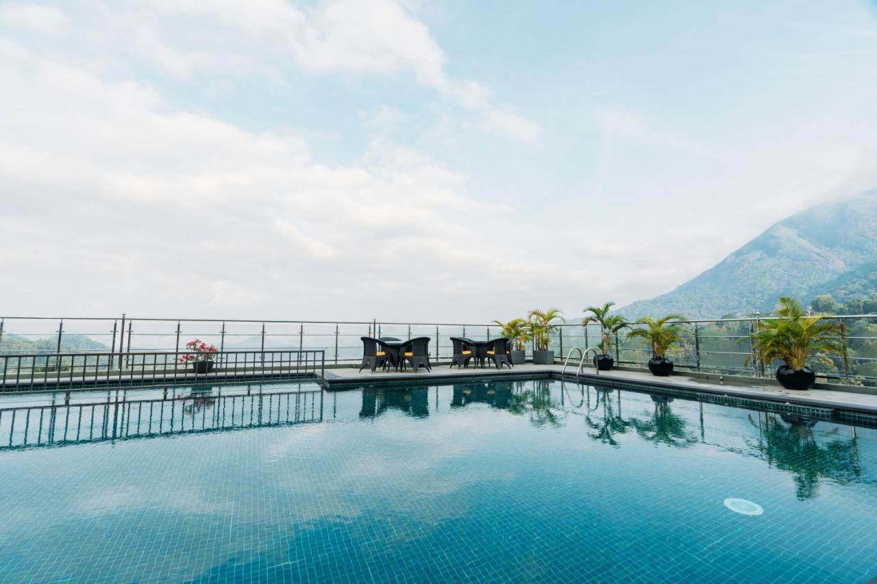全景逍遥酒店 蒙纳 外观 照片 The swimming pool at the top of the hotel