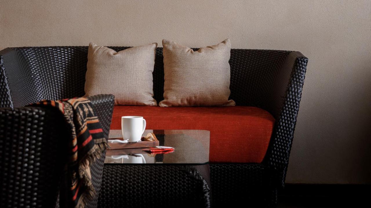 全景逍遥酒店 蒙纳 外观 照片 A rattan sofa