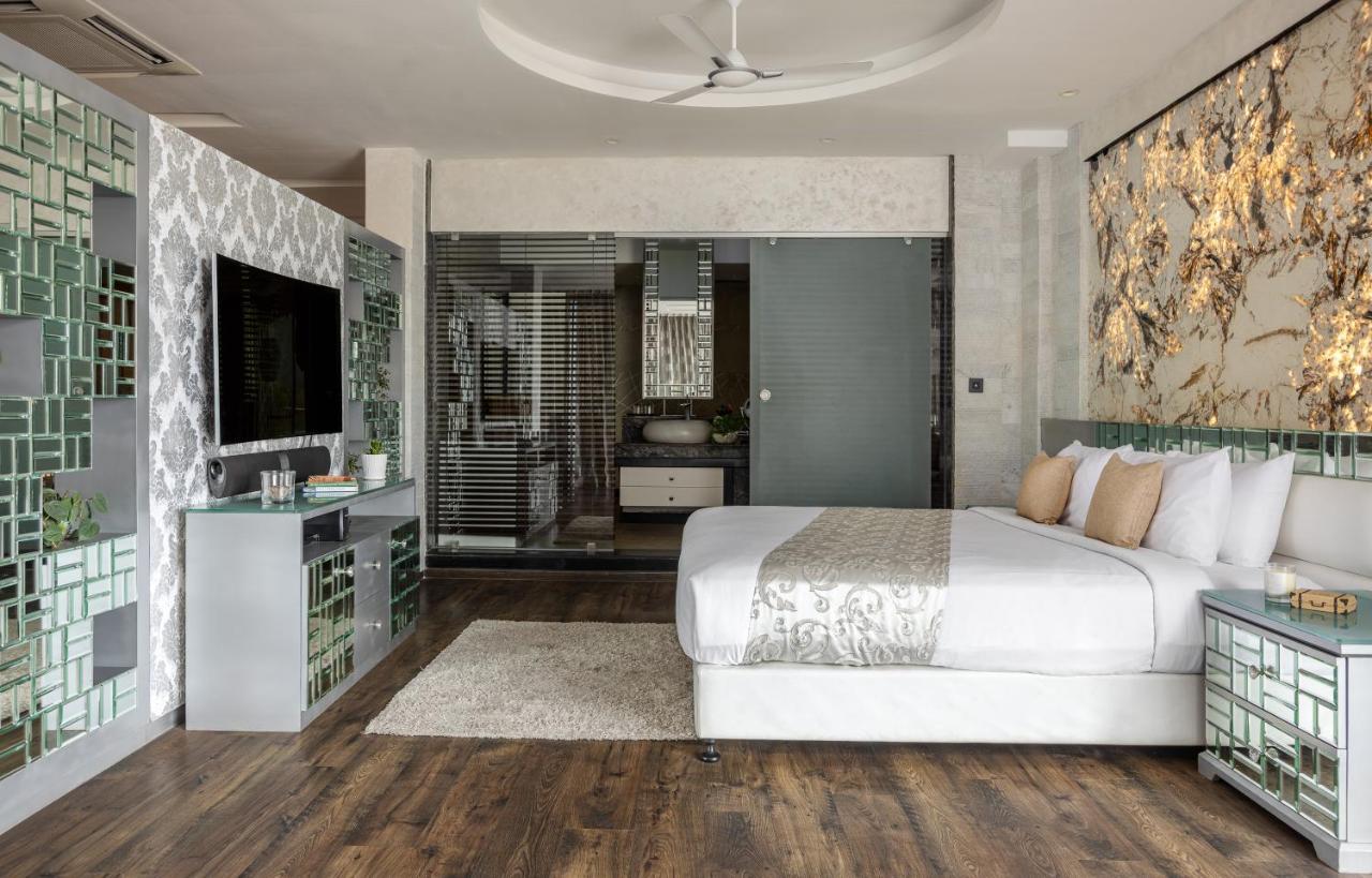 全景逍遥酒店 蒙纳 外观 照片 A bedroom at the hotel