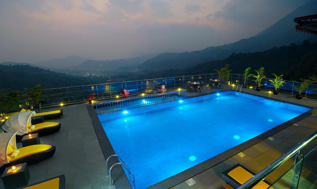 全景逍遥酒店 蒙纳 外观 照片 The swimming pool at the resort