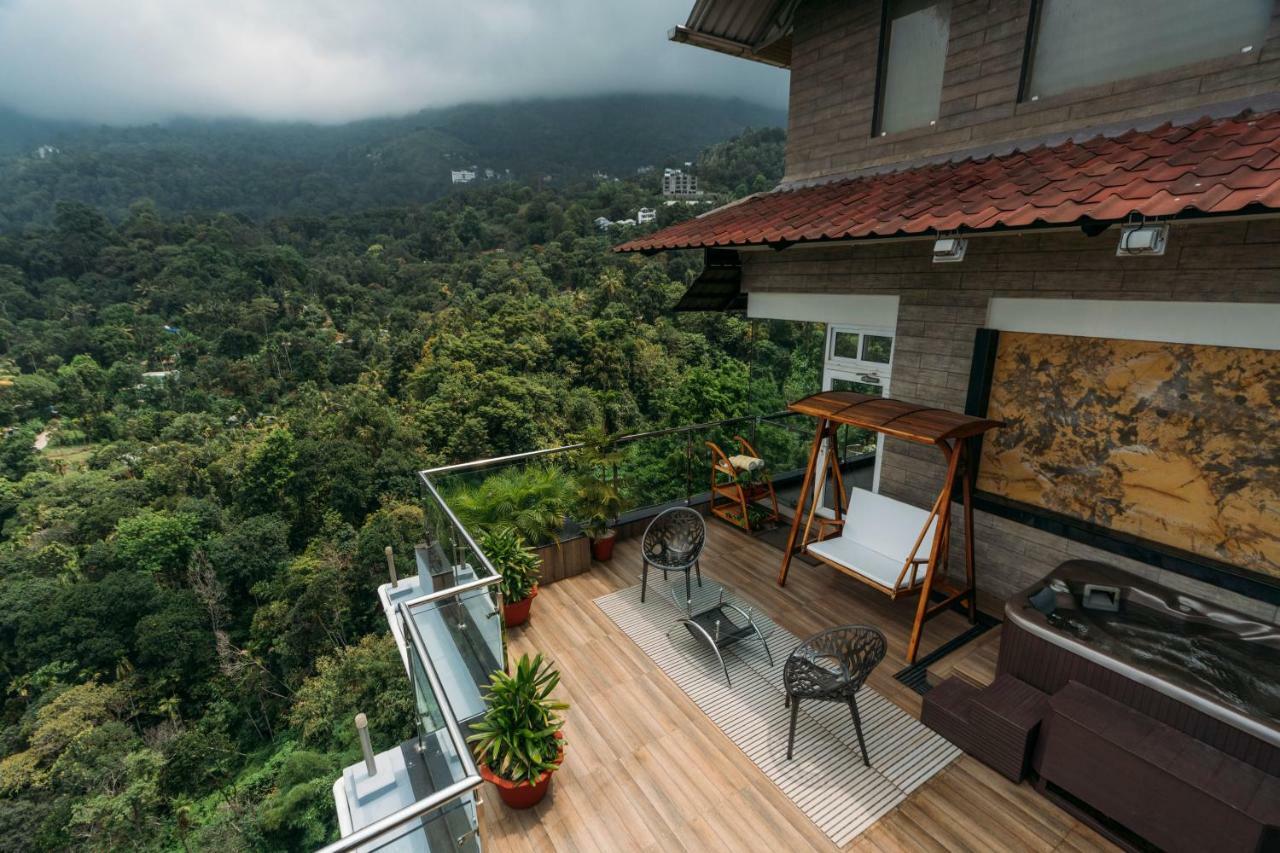 全景逍遥酒店 蒙纳 外观 照片 A view from the balcony of a house in Kerala, India